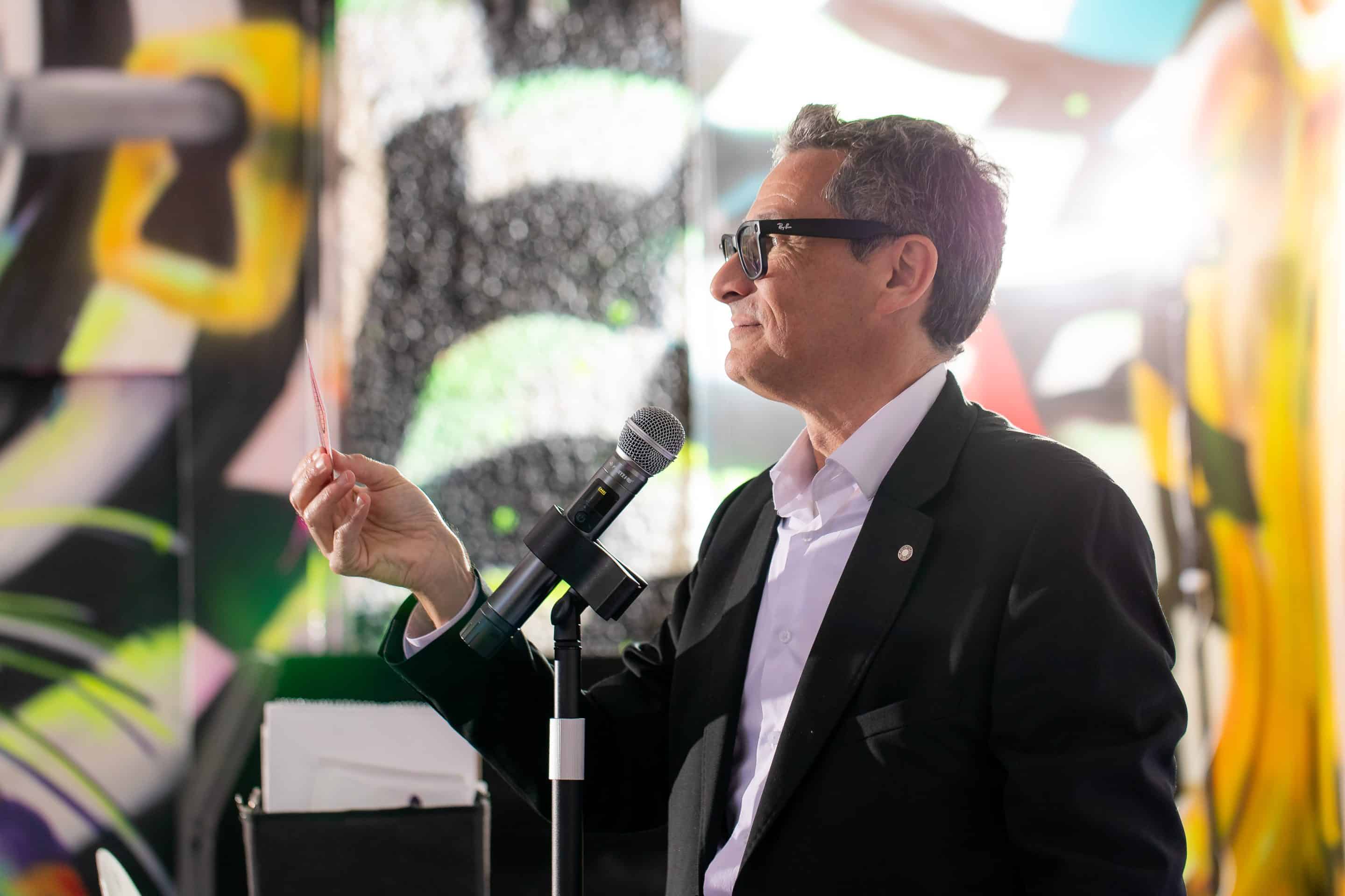 Darryl Rose Performing Cabaret Magic With A Microphone